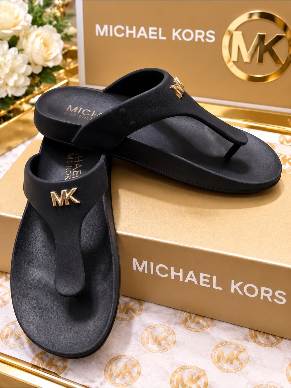 Michael Kors Black Thong Sandals with Gold MK Accent